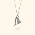 COLLAR CORAZÓN LÍQUIDO PLATEADO