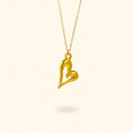 COLLAR CORAZÓN LÍQUIDO DORADO